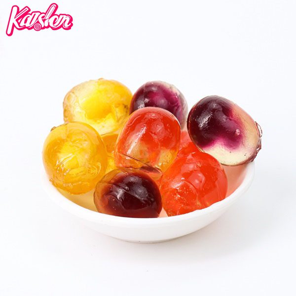 Ball shaped center filled fruit flavors soft candy